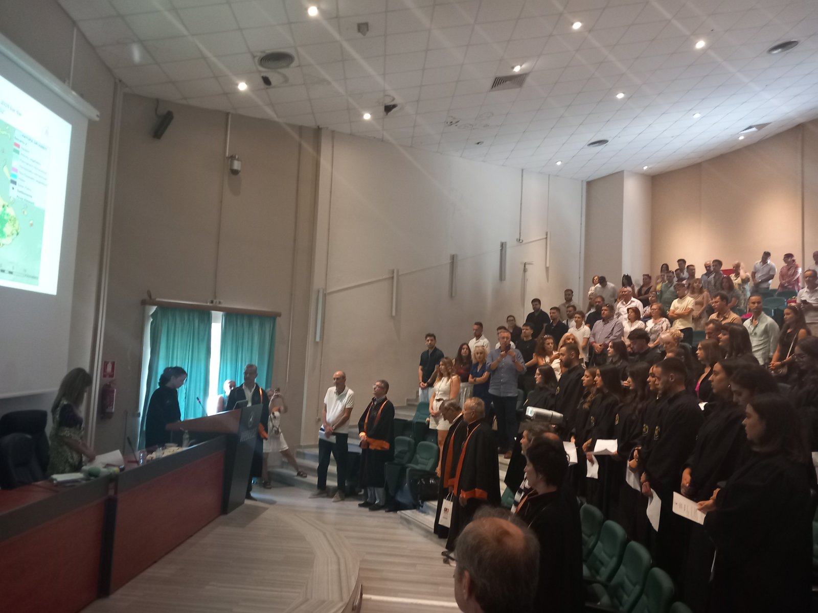 A group of people standing in a room